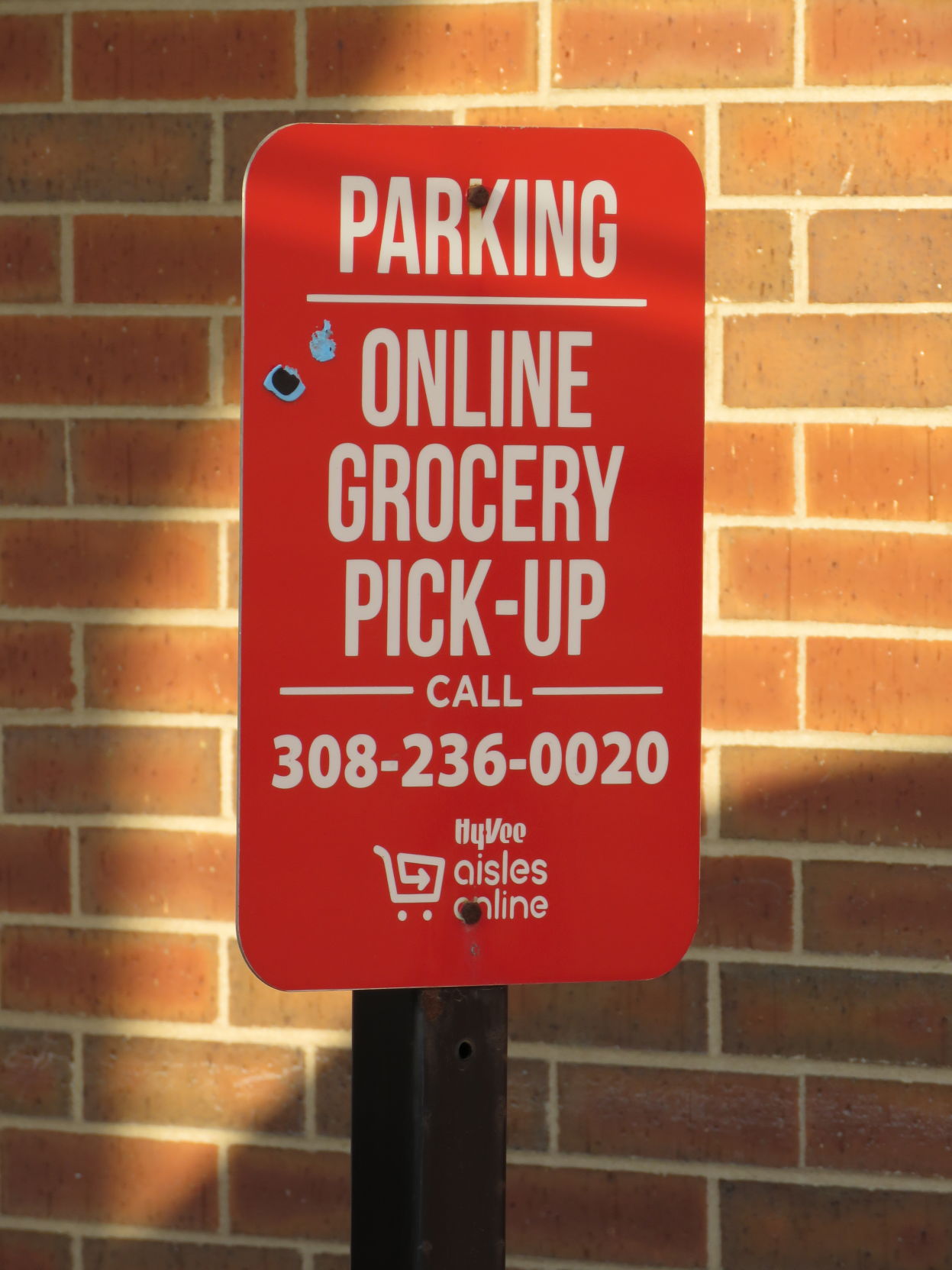 Safe shopping in Kearney pick-up line sign